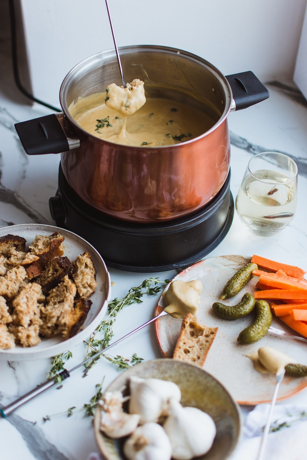 homemade cheese sauce in fondue pot