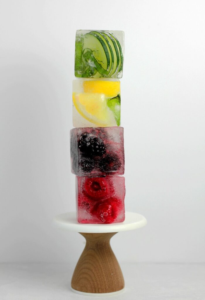 ice cubes with citrus and fruits