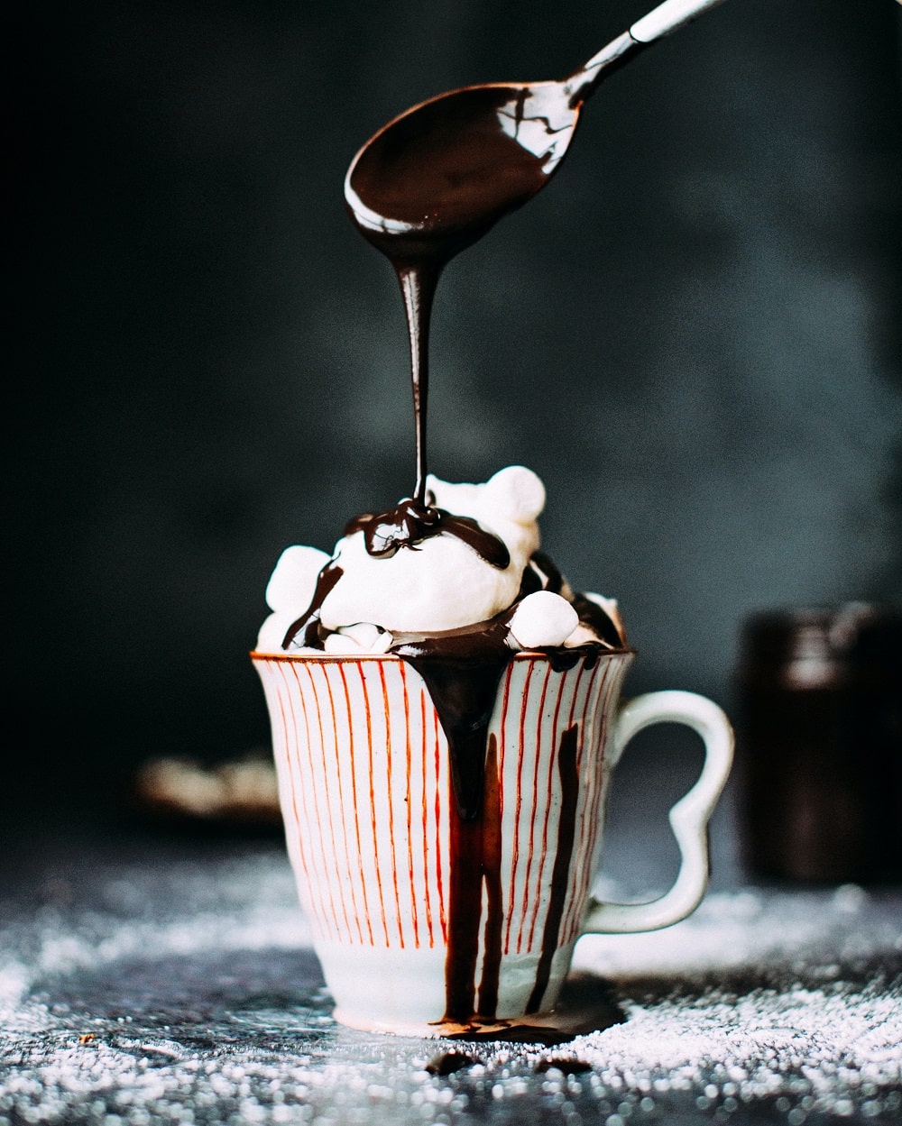 5 minutes all-purpose chocolate glaze poured on whipped cream