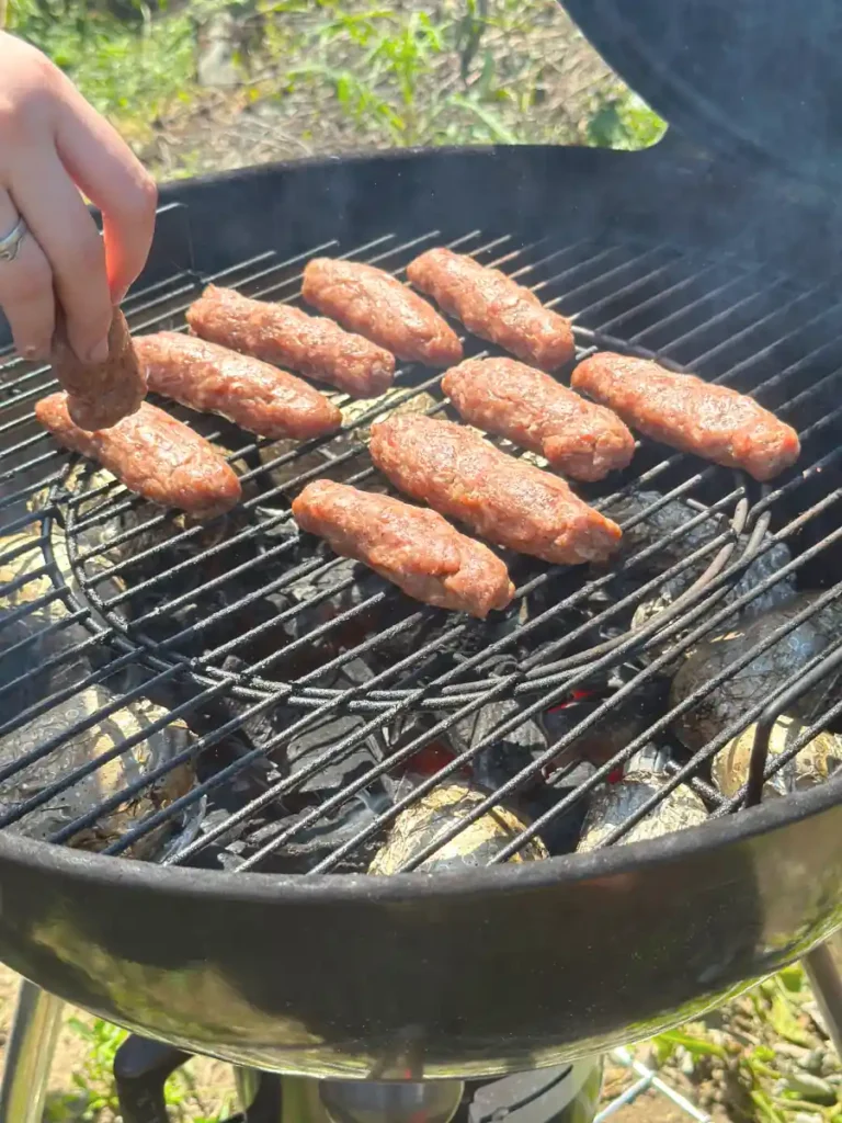 placing mici on the grill